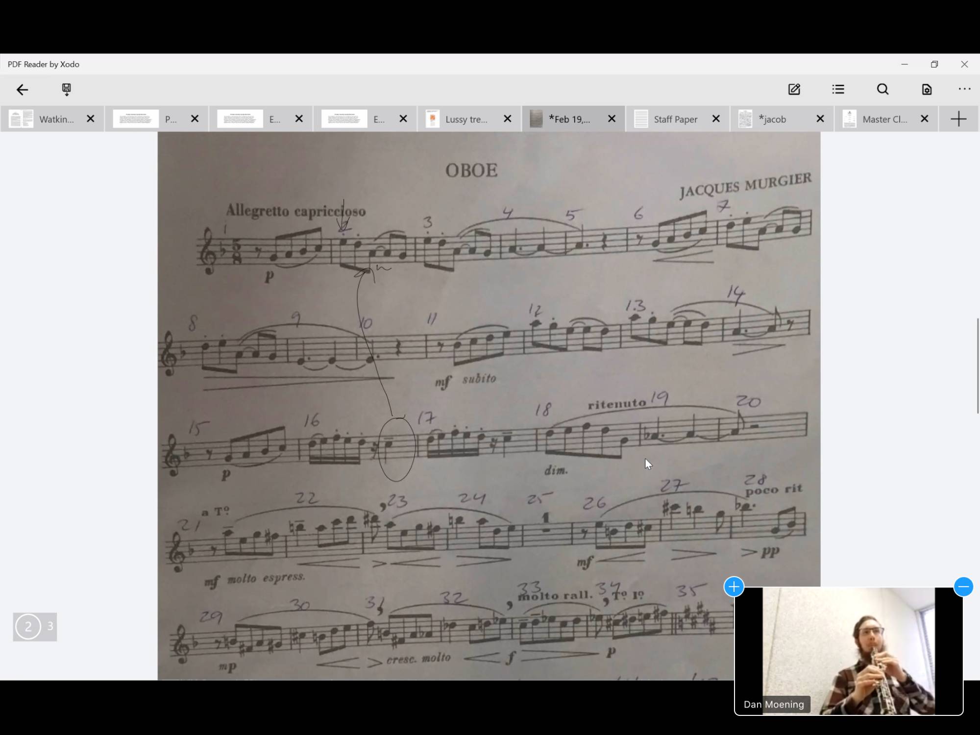 A photo of a Zoom master class with Julia Gjebic. In the photo: score of Capriccio and Daniel in the bottom right hand corner.